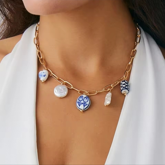 Anthropologie Jewelry - Portofino Blue Gold Charms Necklace